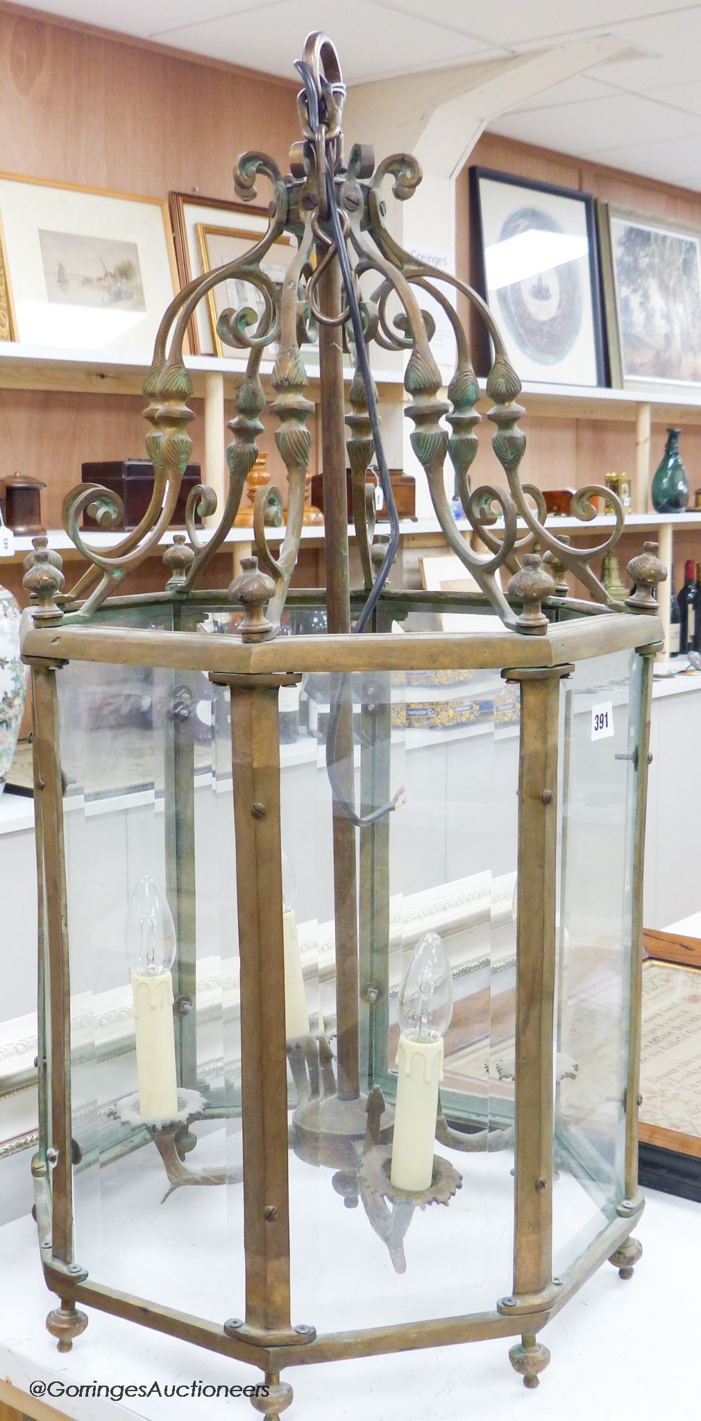 A large bronze and brass hall lantern, with ceiling fitment, overall height 86cm H approximately 100cm